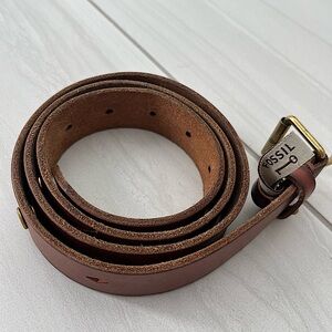 Brown belt with golden buckle